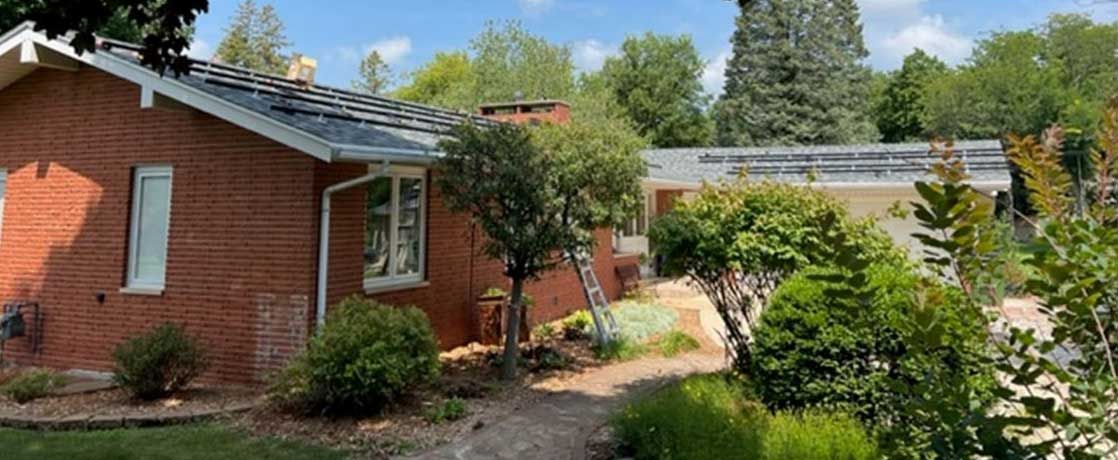 Home with solar panel mounting rails