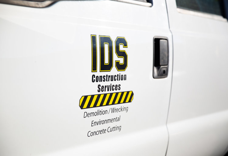 IDS Demolition vehicle service sign