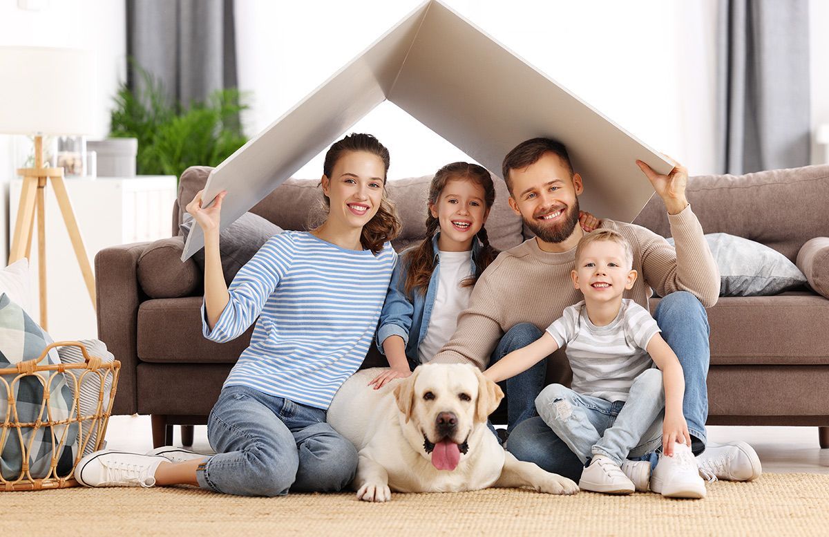 Happy family with their dog