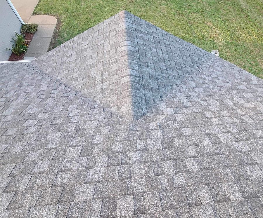 An aerial view of a roof with a pyramid-shaped roof.