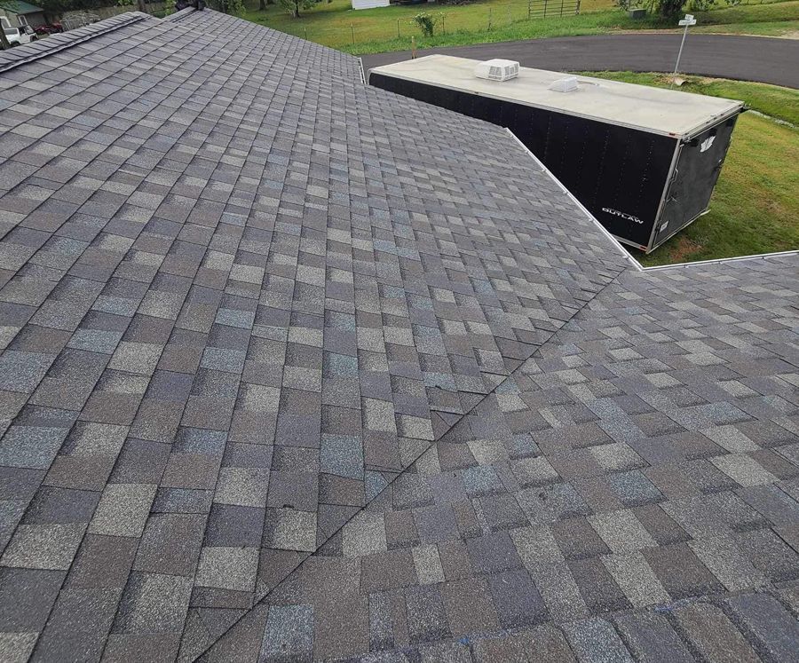 A close up of a roof with shingles on it