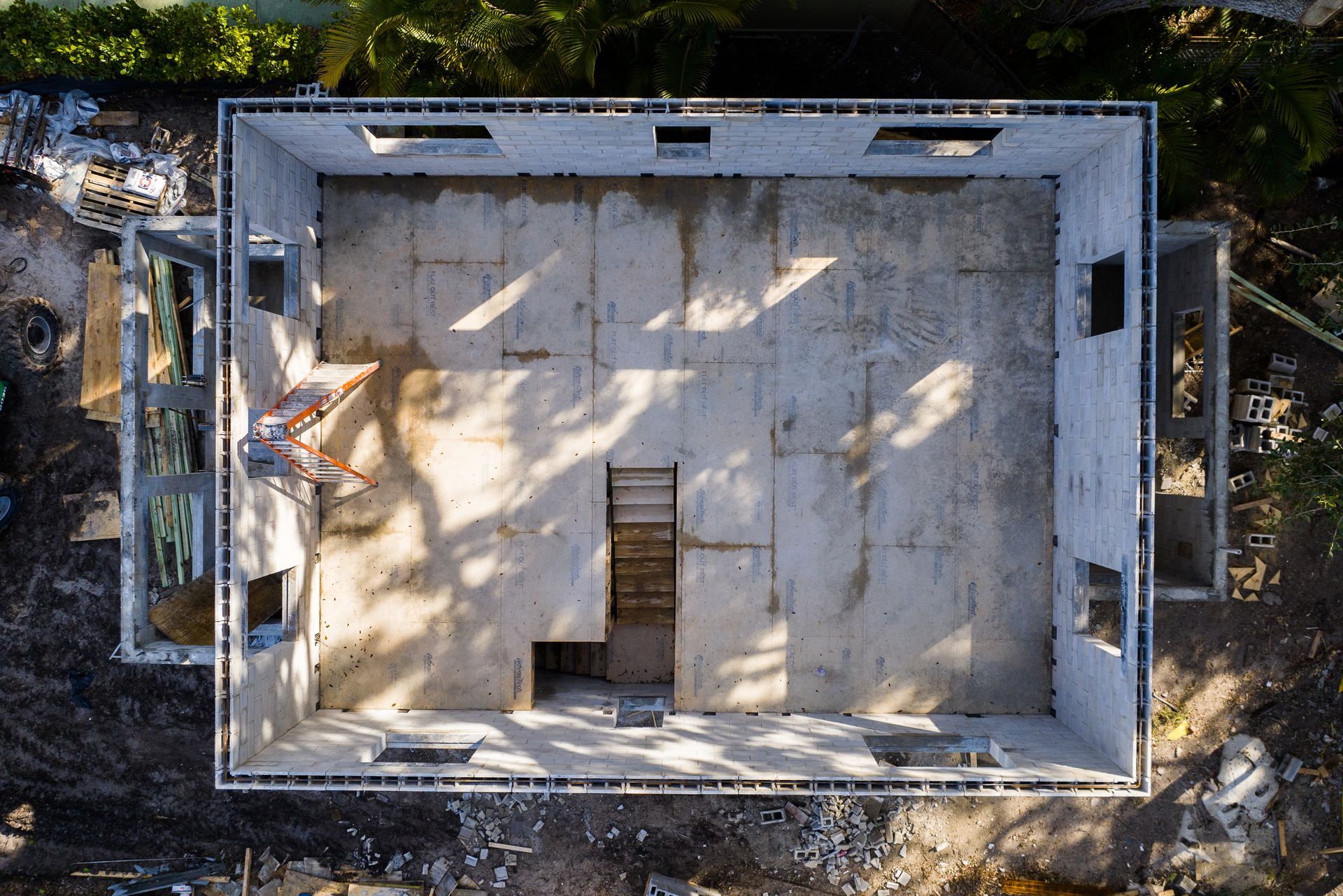 An aerial view of a building under construction.