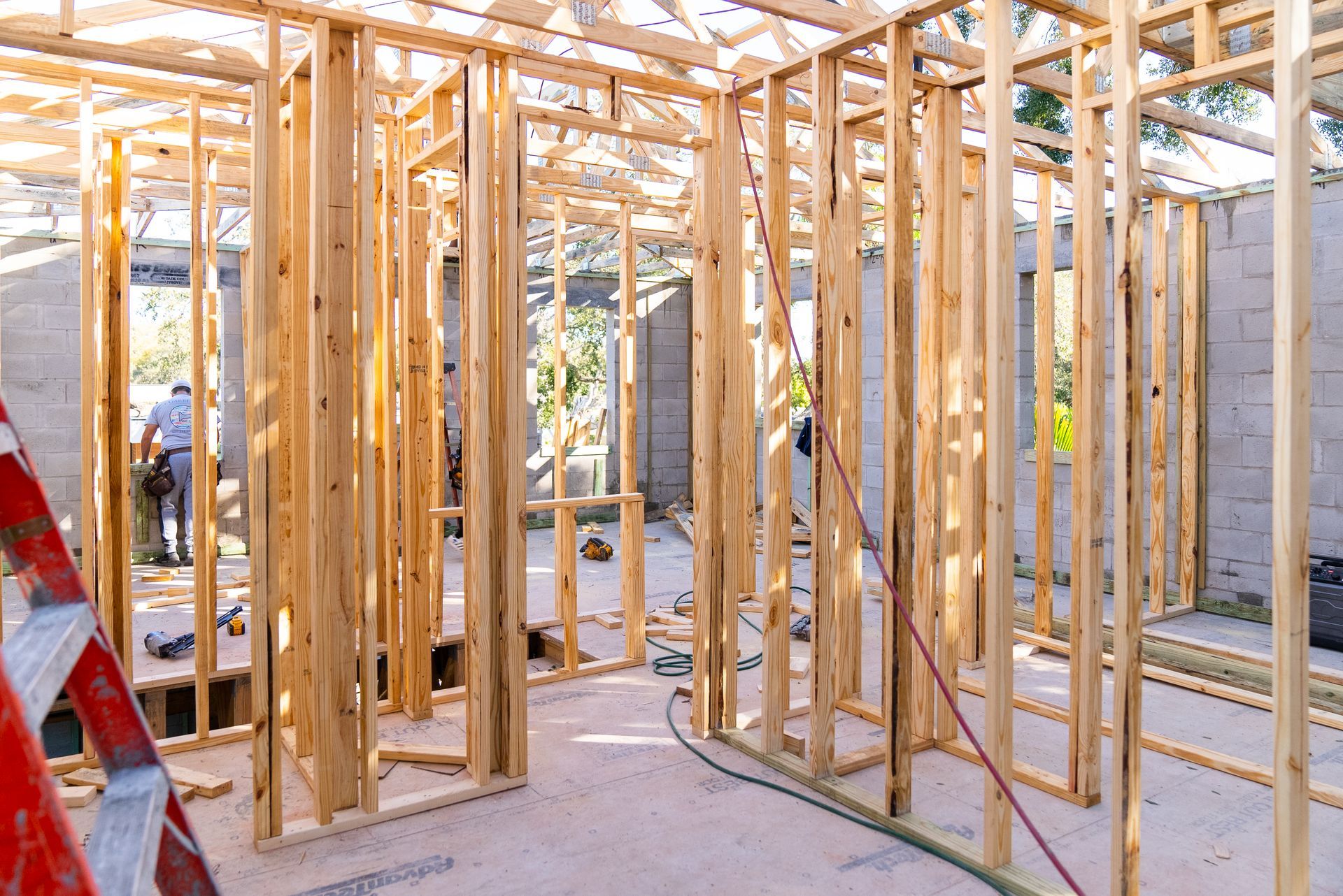 A house is being built with wooden beams.