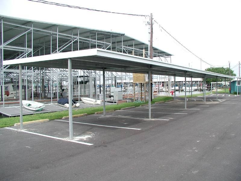 A parking lot with a canopy over it
