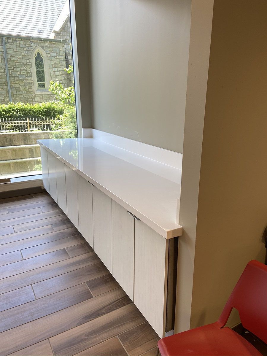 White countertop with white cabinets