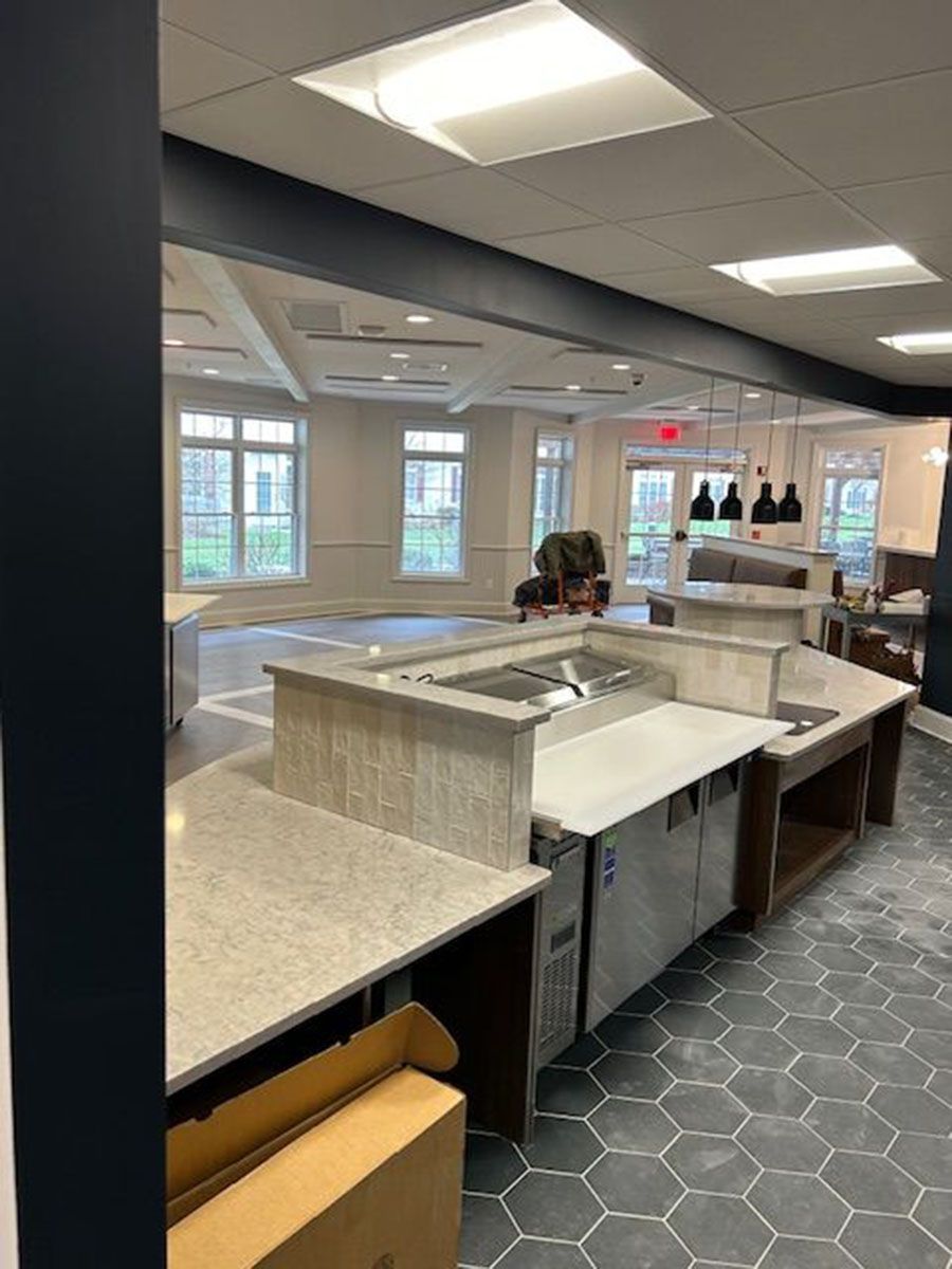 A large room with a lot of counters and tables