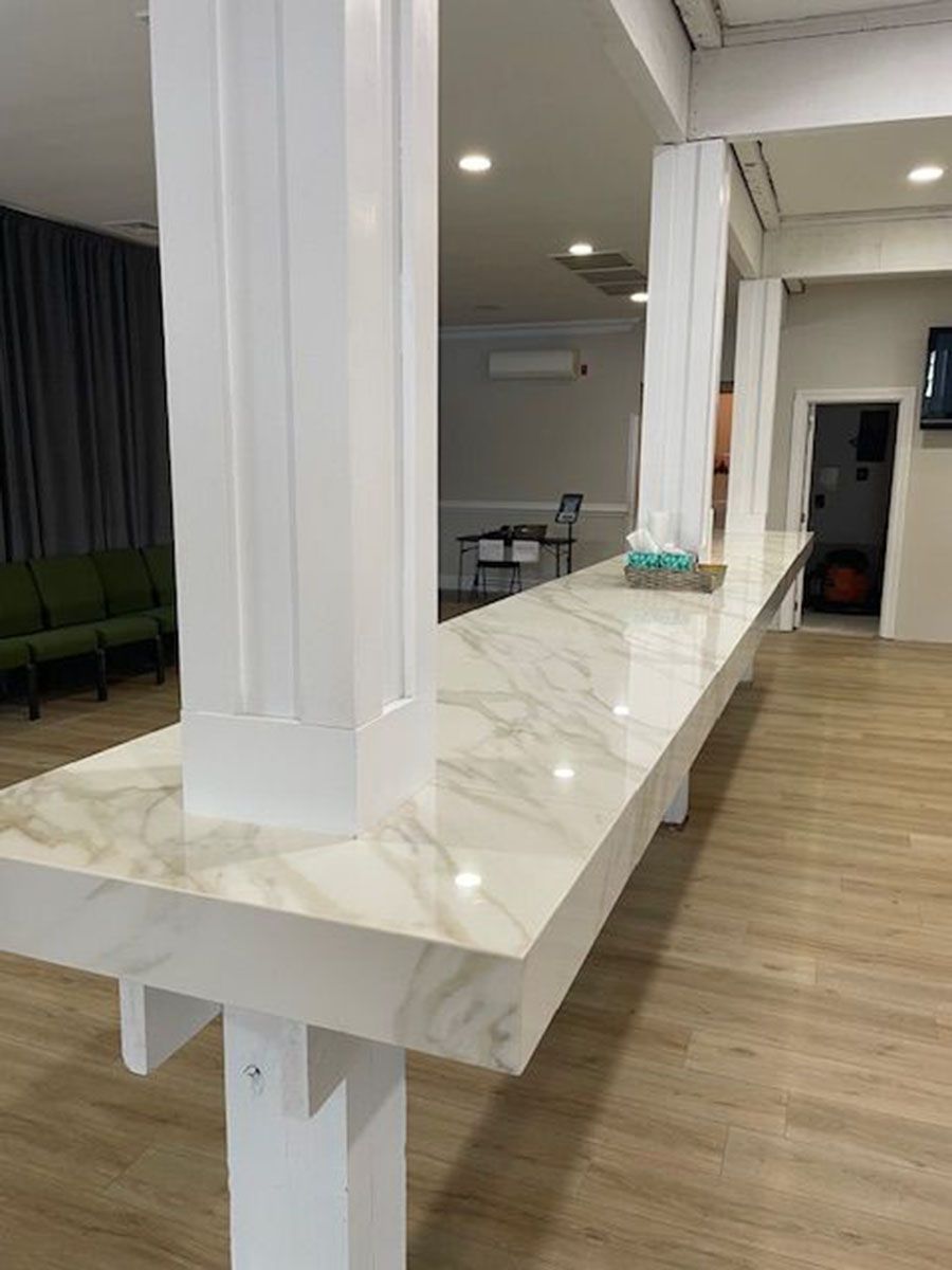 A long sturdy counter in the middle of the room