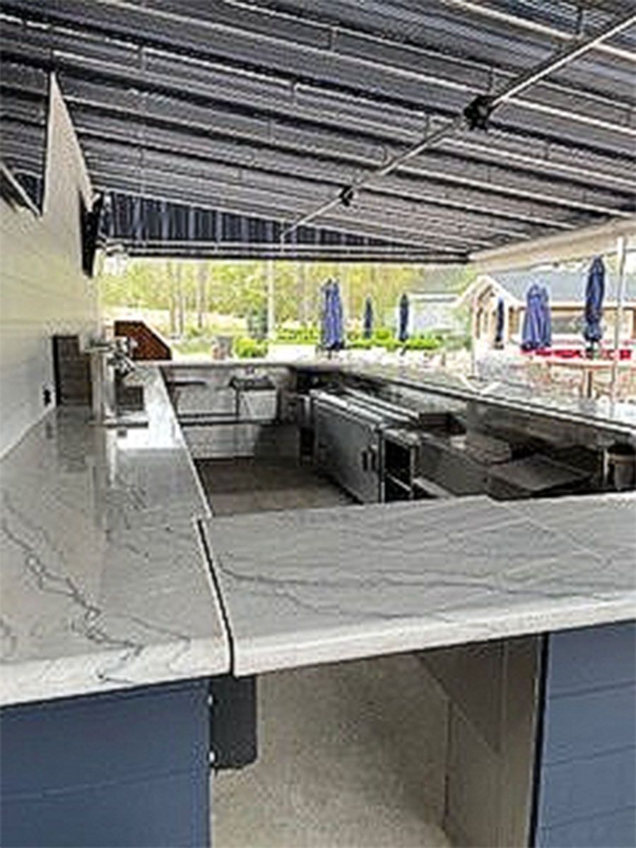 A beautiful kitchen with a large countertop