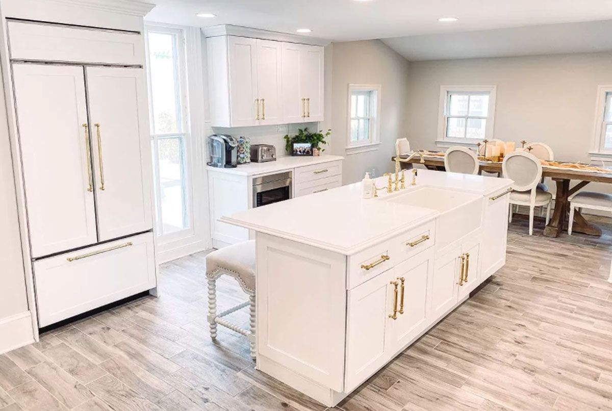 There is a large island in the middle of the kitchen