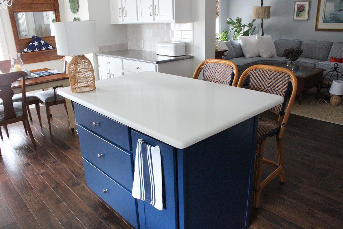 A kitchen with a beautiful white countertop