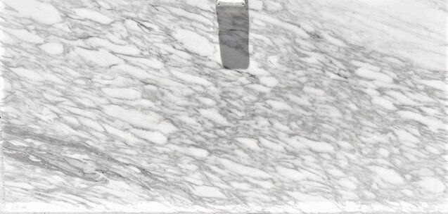 A black and white photo of a marble floor.