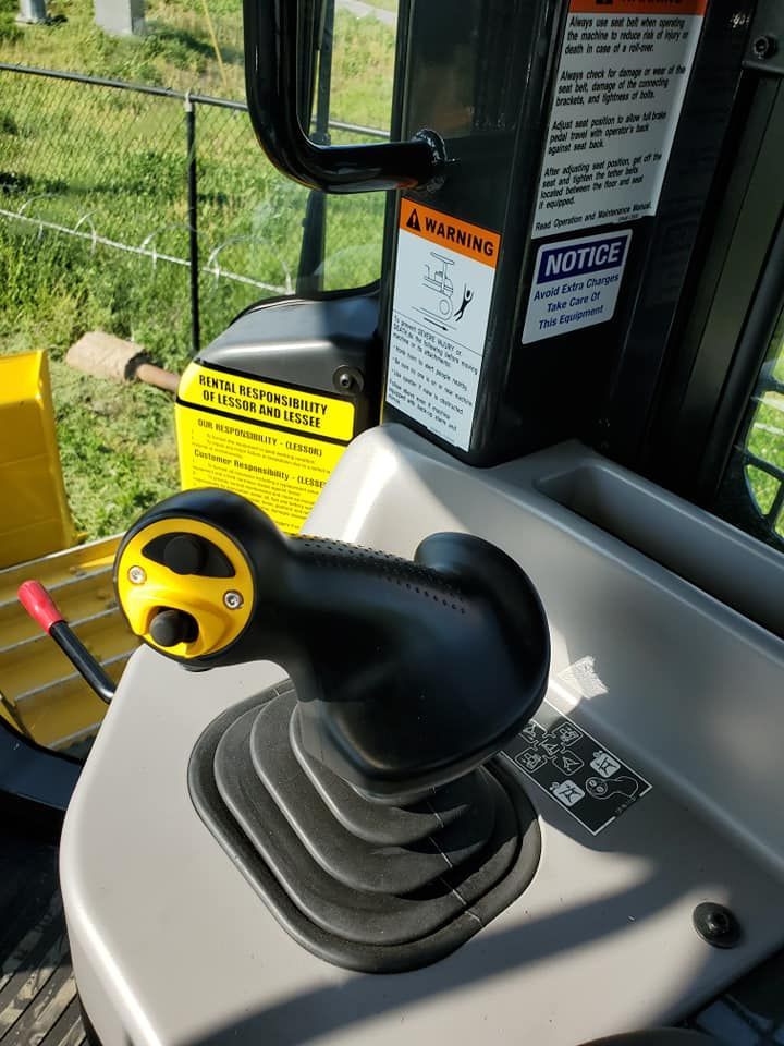 A close up of a control panel on a bulldozer.