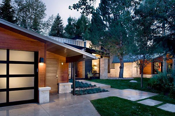 A modern house with a glass garage door