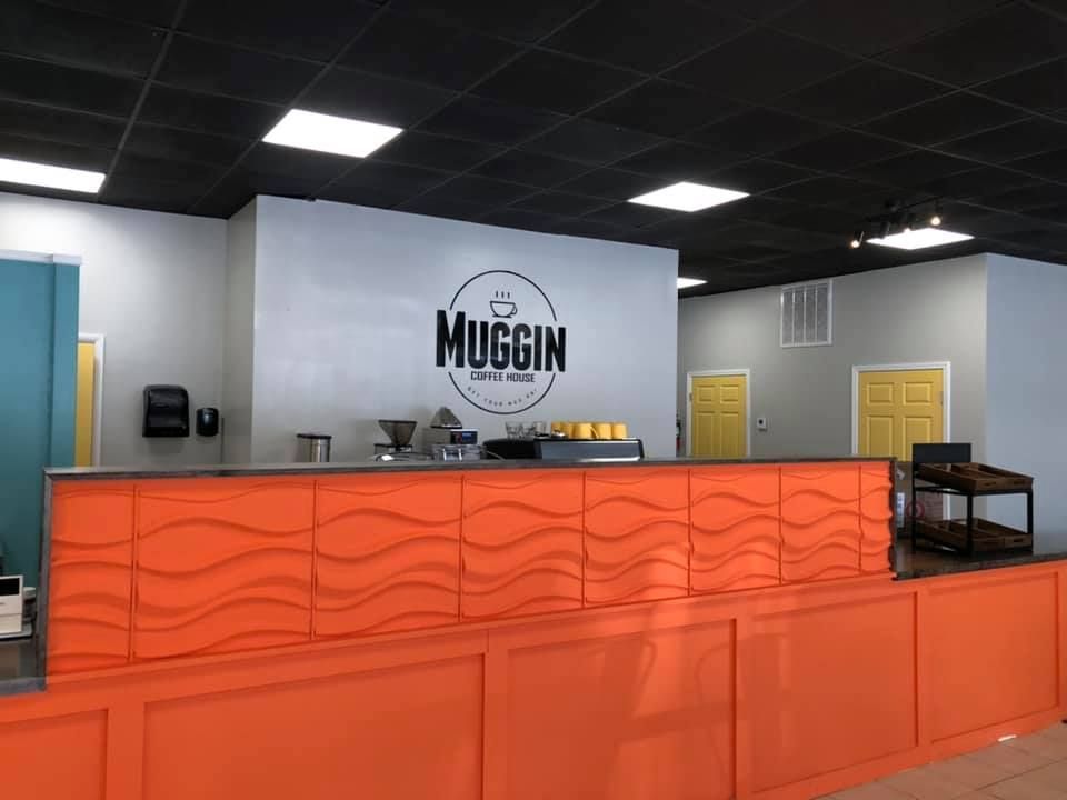 Coffee shop interior with orange counter, 