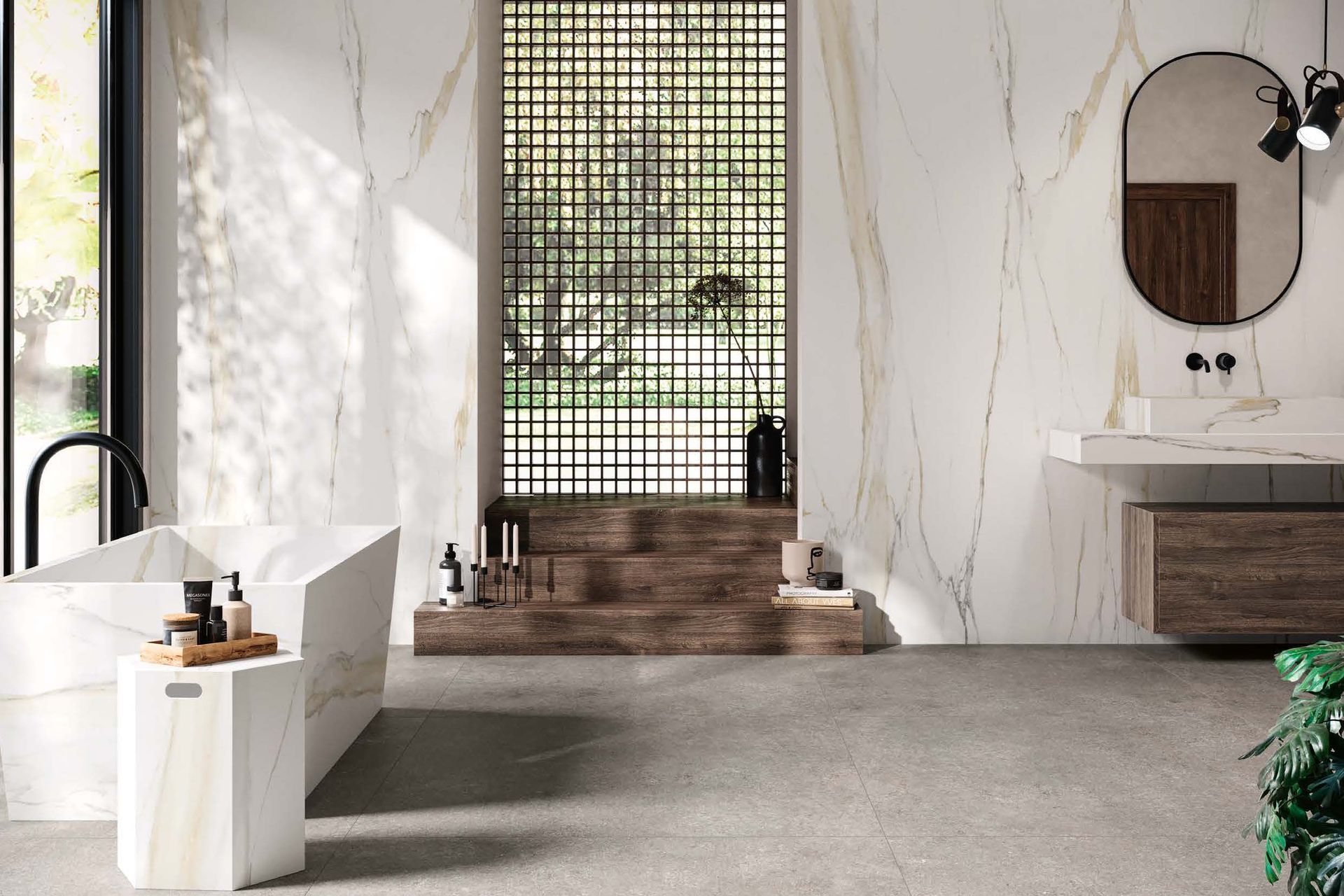 Minimalist spa-like bathroom with white marble walls, a freestanding tub, and a vanity with a round mirror