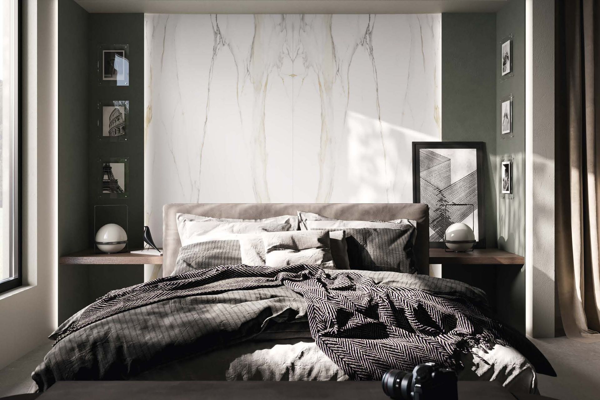 Modern bedroom with a low bed, gray bedding, marble accent wall, and framed art on shelves