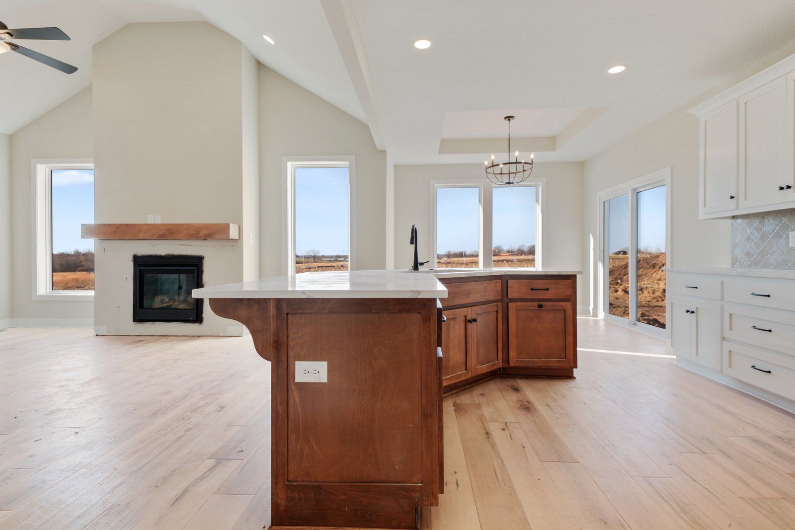 There is a large island in the middle of the kitchen.