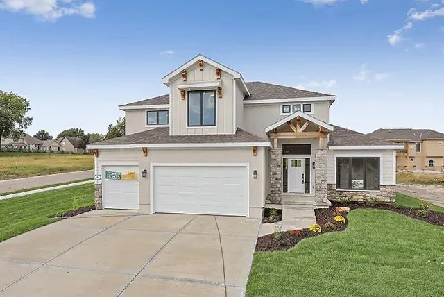 A large house with a lot of grass in front of it.