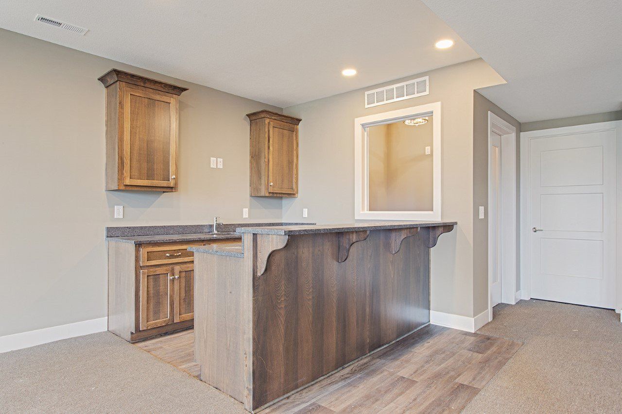 There is a bar in the middle of the room.