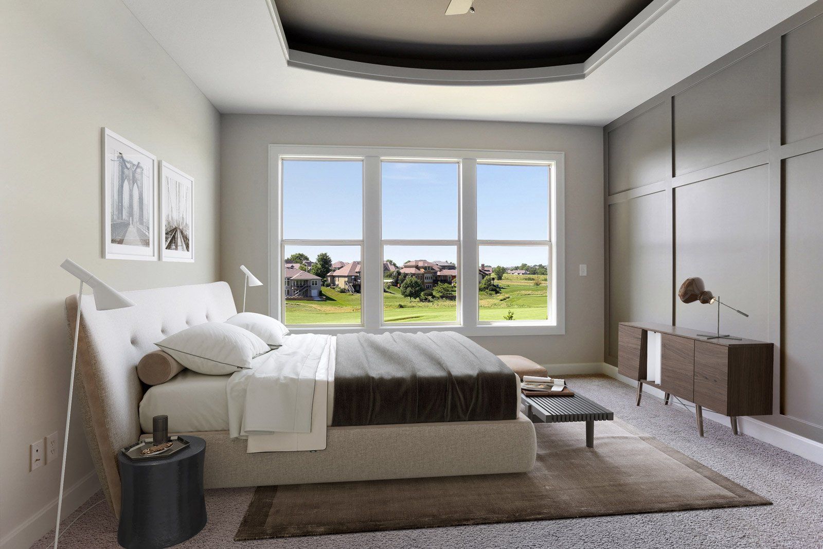 A bedroom with a large bed and a lot of windows