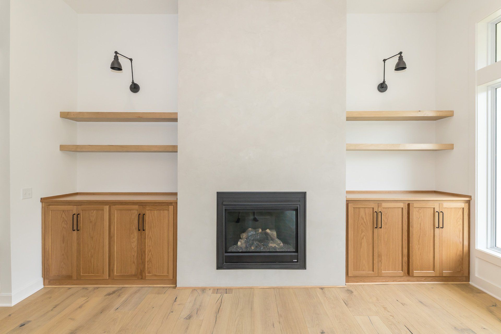 There is a fireplace in the middle of the room.