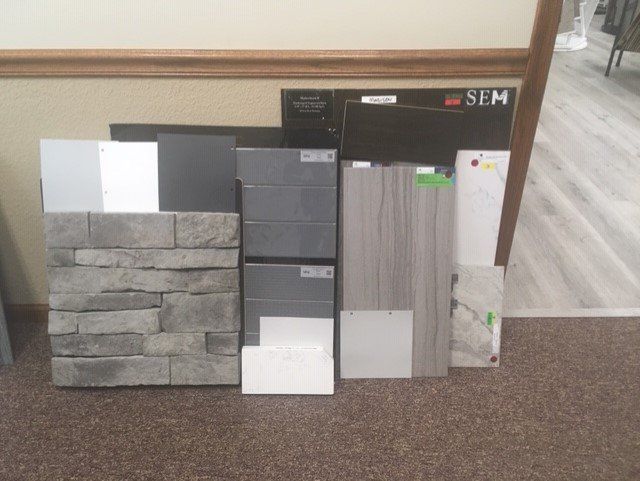 A selection of tiles and bricks with sfm written on the bottom