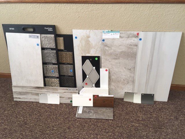 A bunch of tiles are laying on the floor