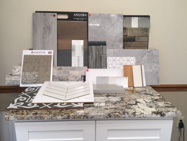 A table with a lot of different types of tiles on it