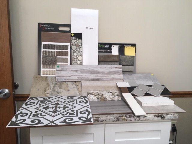 A bunch of tiles are sitting on top of a counter