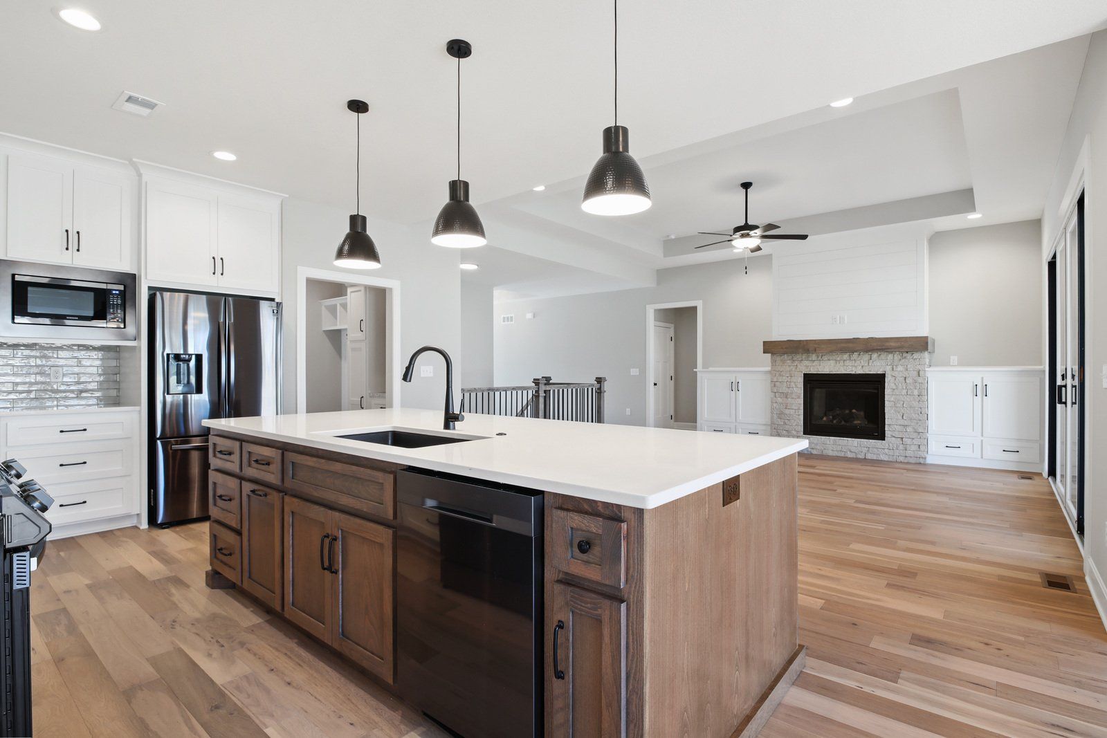 There is a large island in the middle of the kitchen.