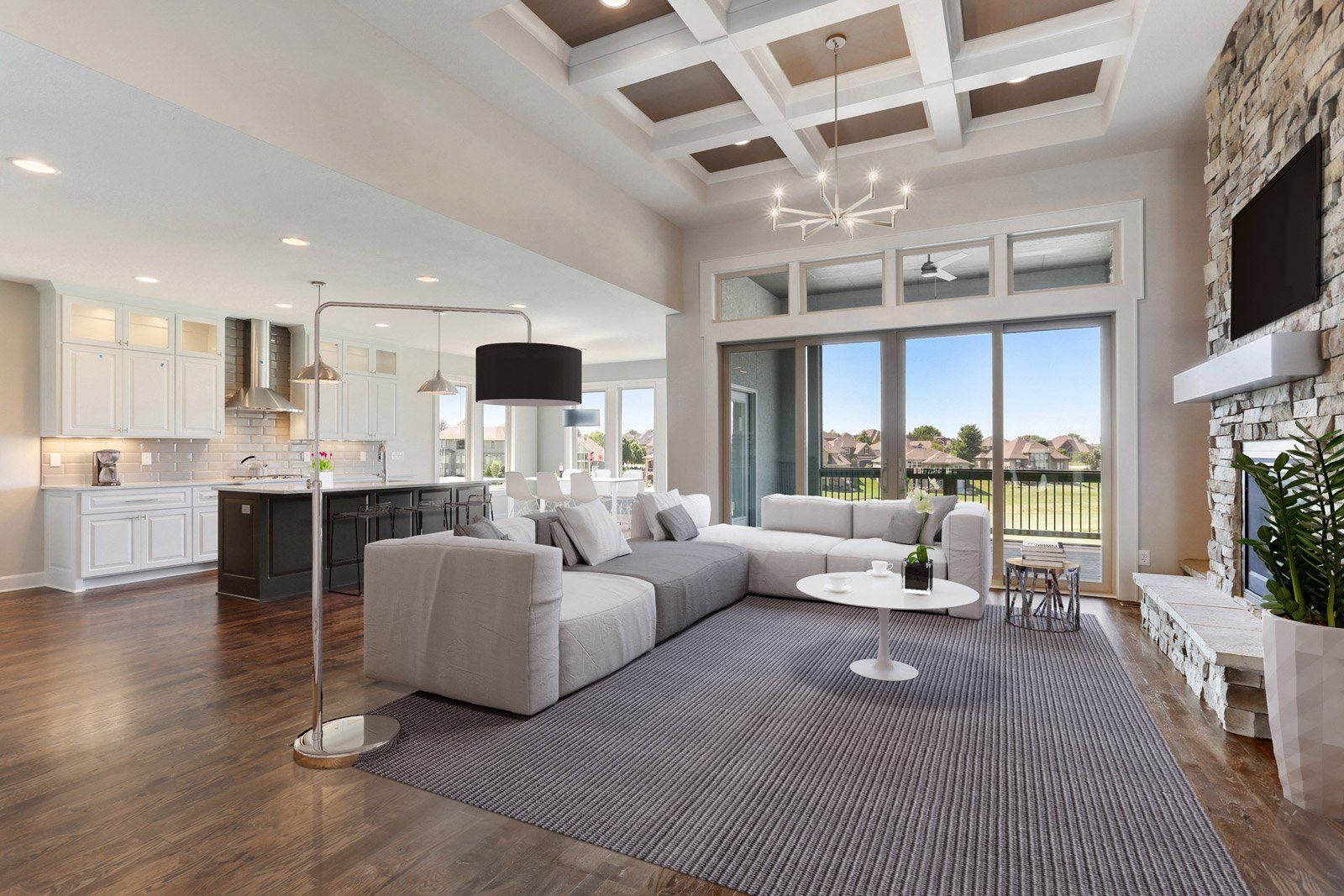 A living room filled with furniture and a fireplace.