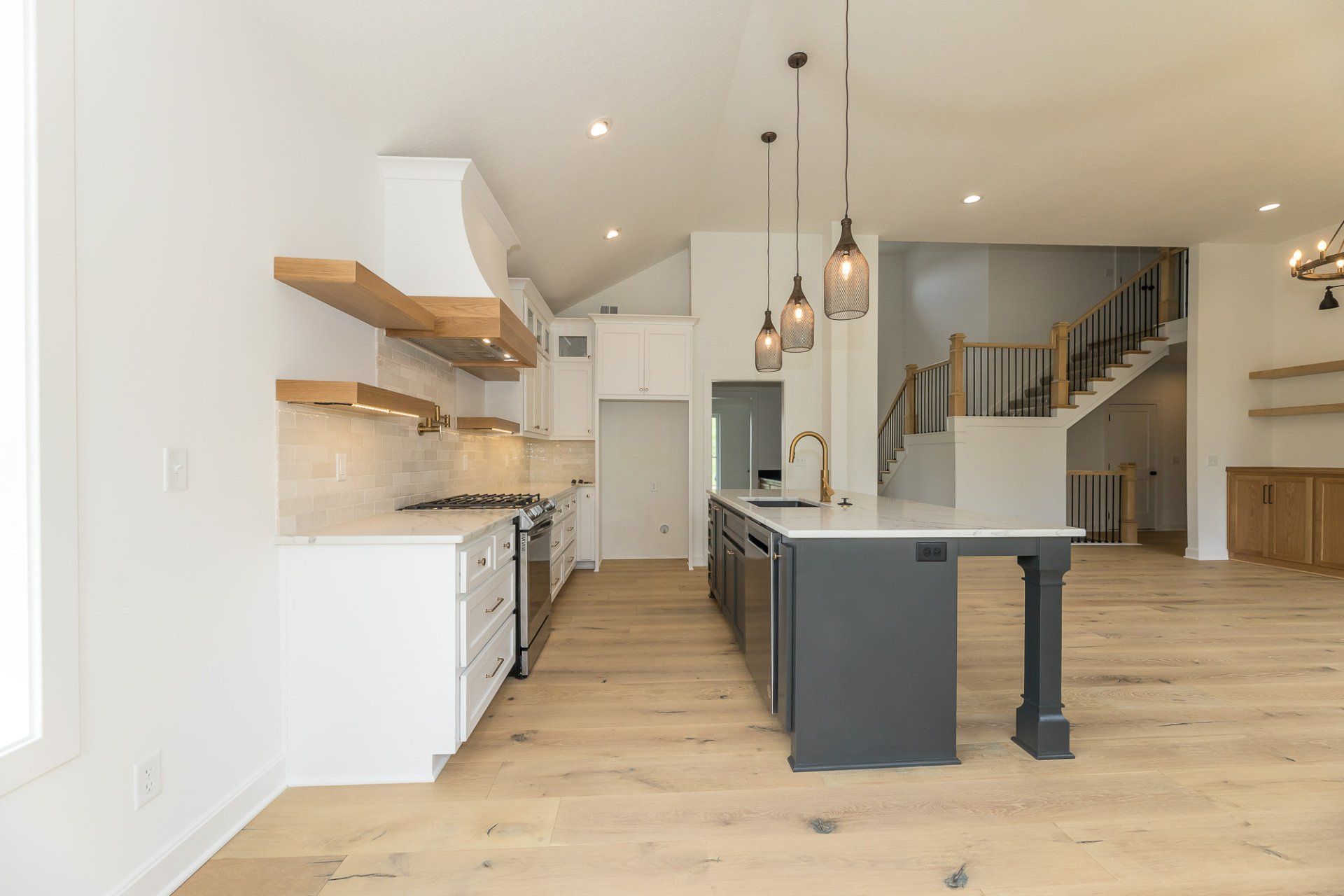 There is a large island in the middle of the kitchen.