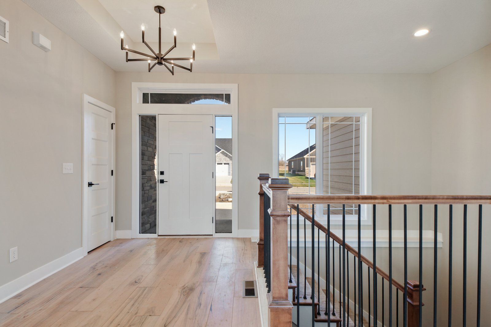 There is a staircase leading up to the second floor of a house.