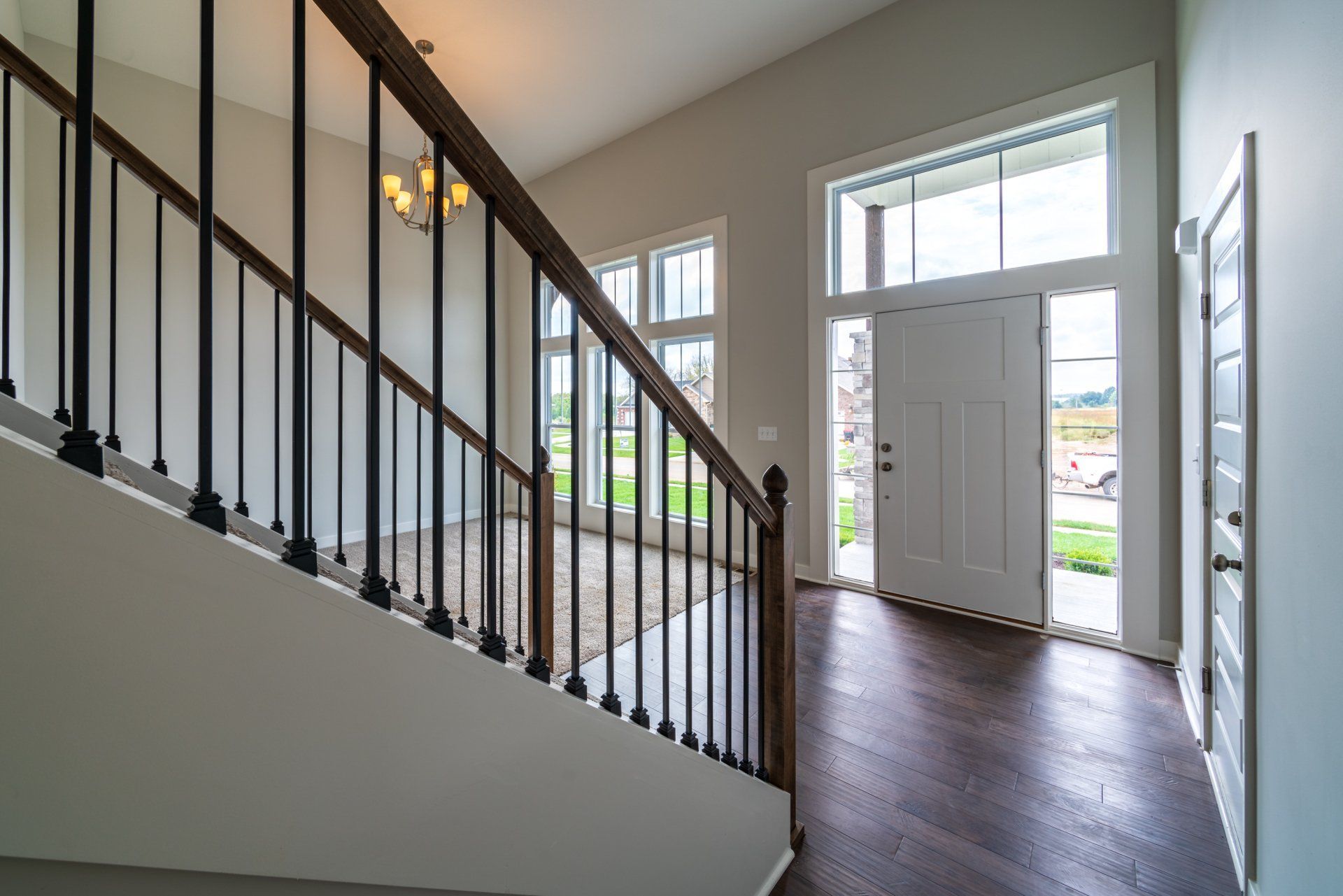 There is a staircase leading up to the second floor of a house.