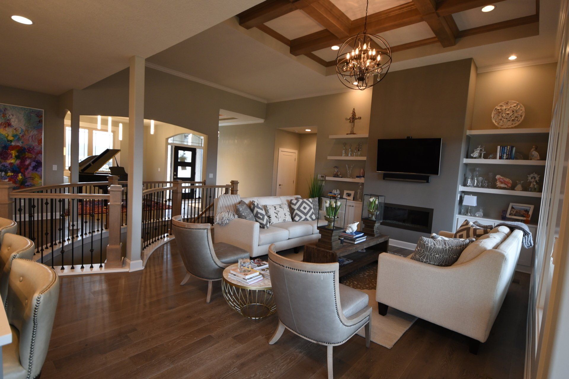 A living room filled with furniture and a fireplace.