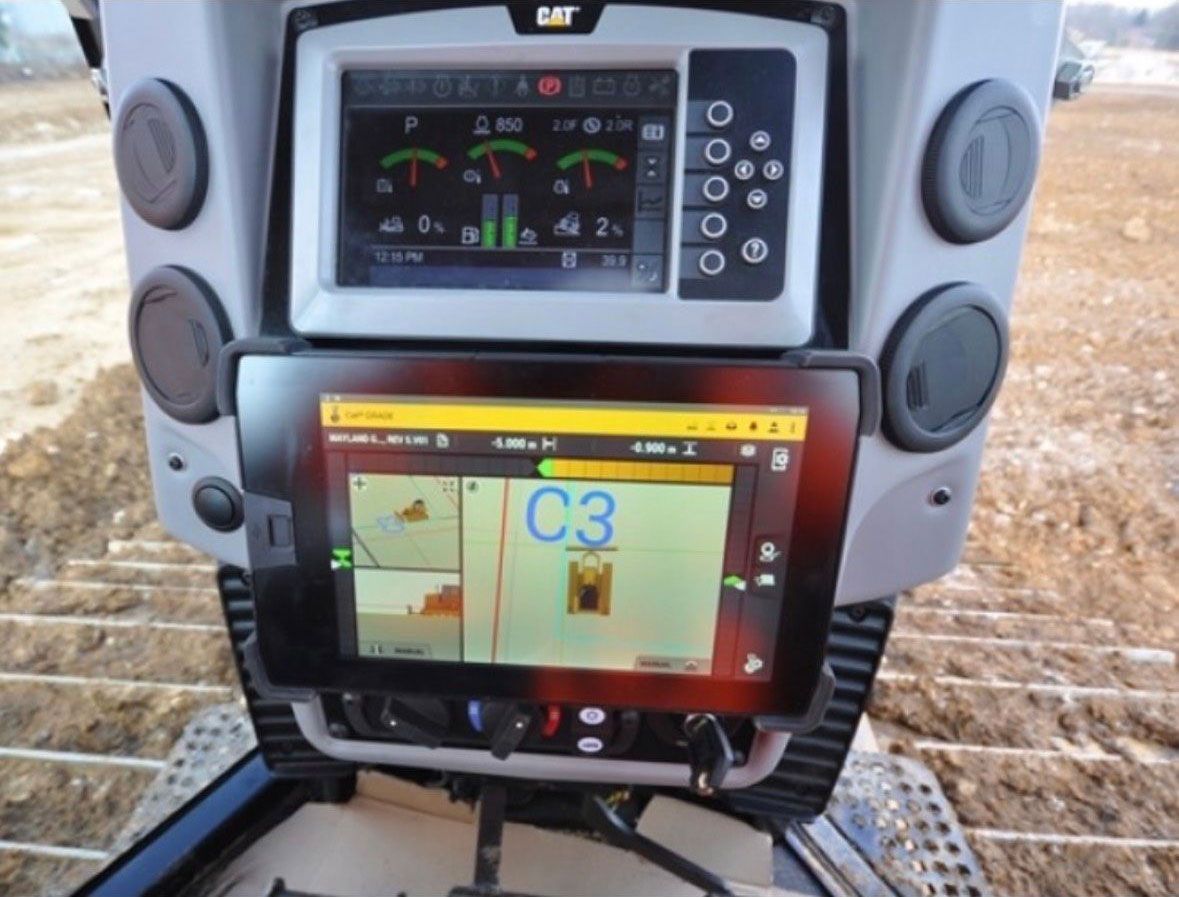 A GPS grading machine with a screen that says c3 on it