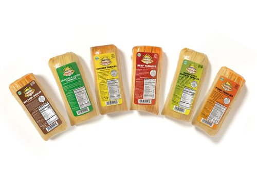 Six assorted flavored snack bars in colorful wrappers arranged in a fan shape on a white background