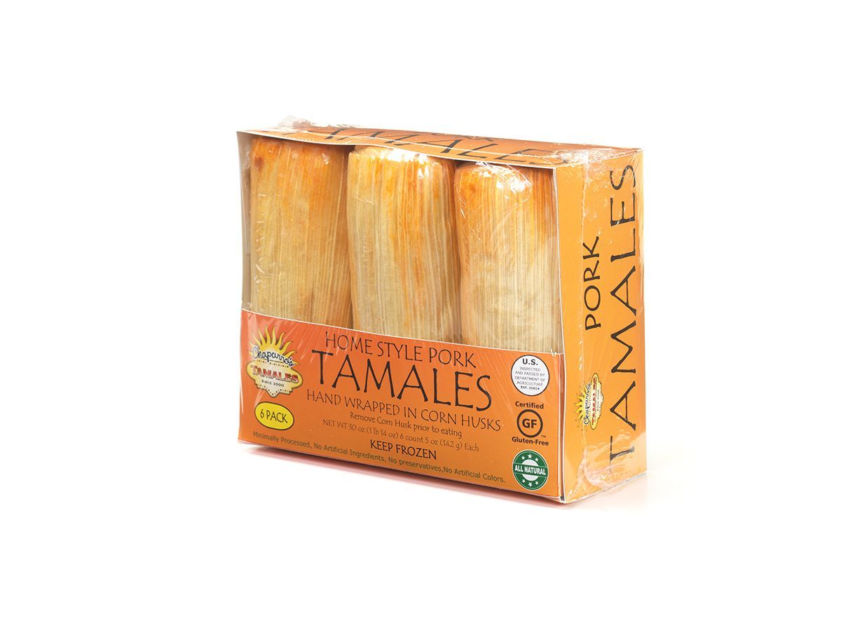 Package of orange tamales in a clear plastic box with an orange label