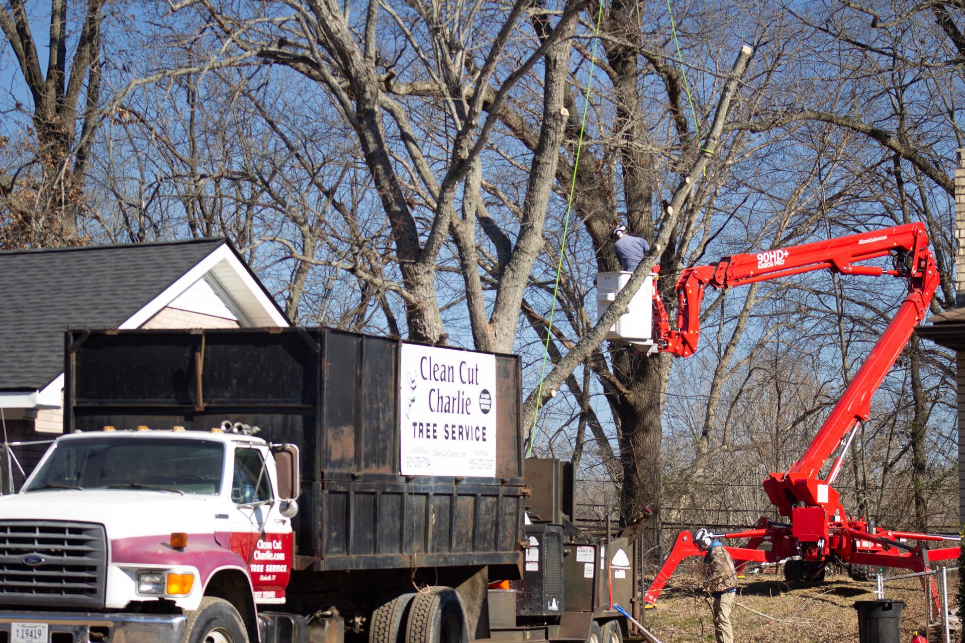 A dump truck with a sign that says 'county' on it