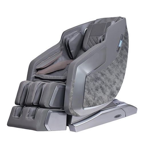 Gray massage chair with footrest and patterned side panel.