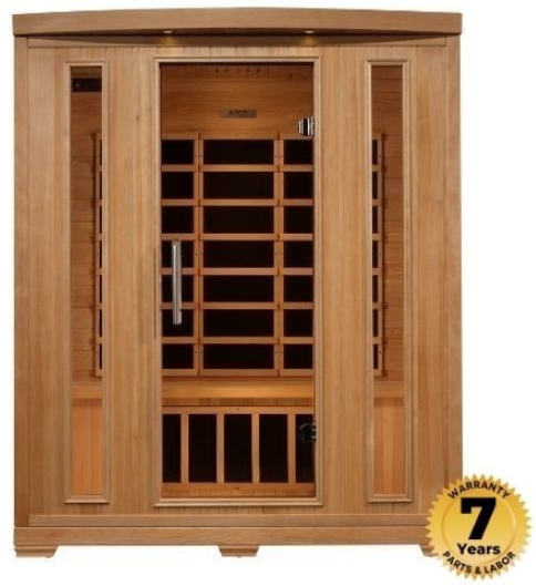 Wooden infrared sauna with glass door and side panels, warm lighting.