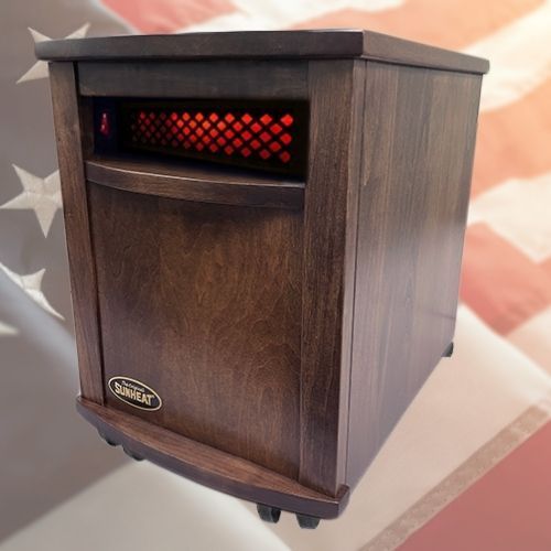 Wooden infrared space heater with red glowing heating element.