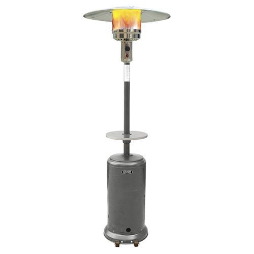 Outdoor patio heater with a lit flame, grey metal and umbrella top.