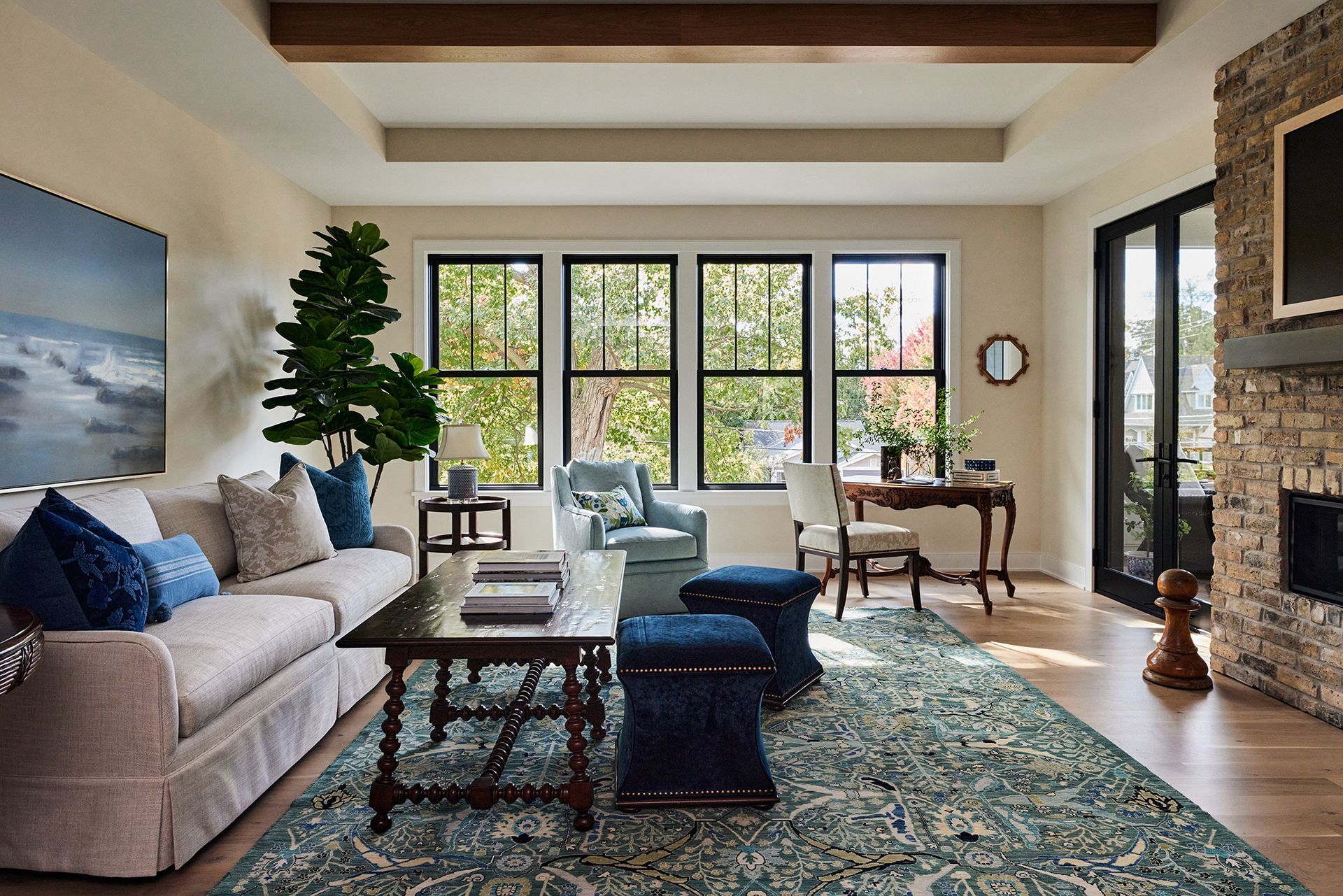 A living room filled with furniture and a fireplace.