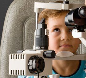 Kid having an eye check-up