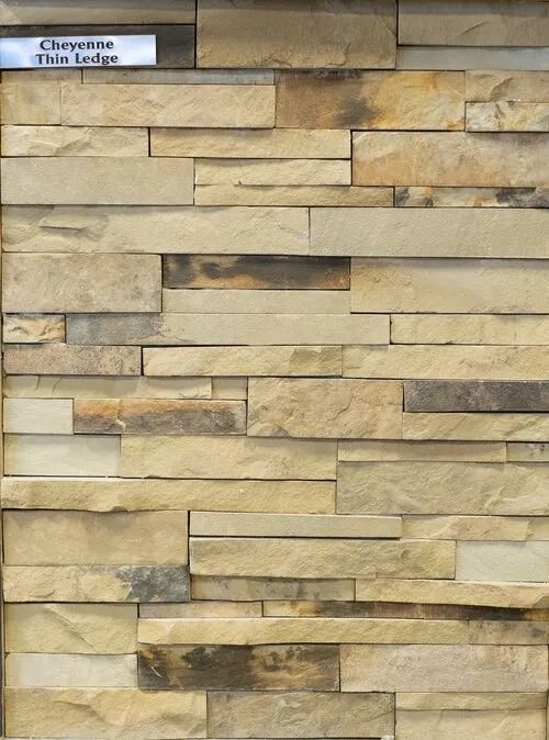 Stone veneer in shades of tan and brown, labeled