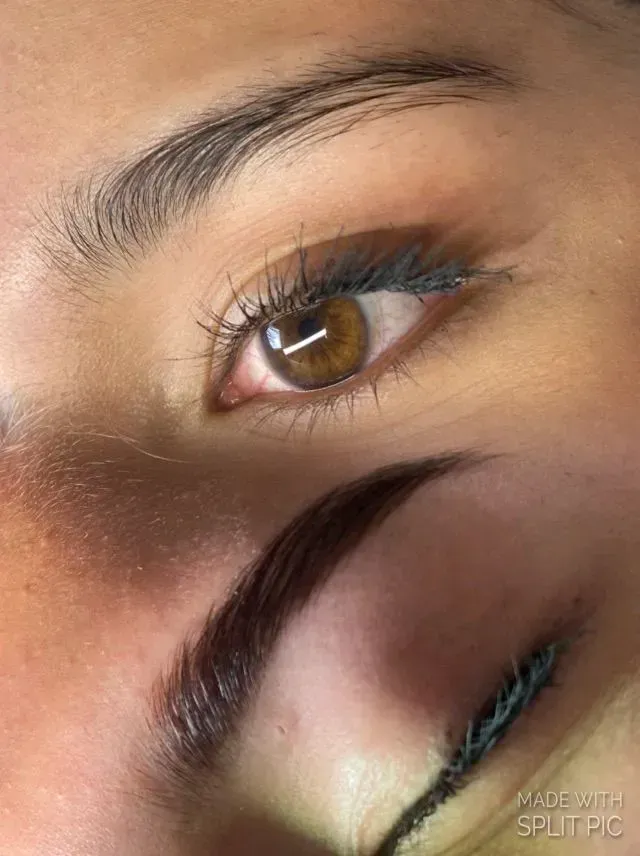 Close-up of a brown eye and eyebrow above a closed eye with teal eyeliner and long lashes
