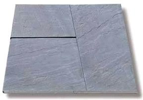 Gray slate tiles arranged together.