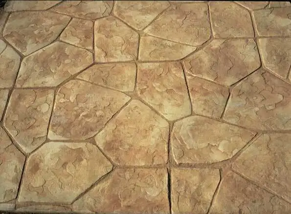 A close up of a stone floor with a geometric pattern