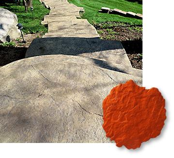 A concrete walkway with a red stamp on it